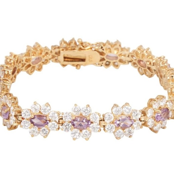 Jewelry - 925 Stamped tennis bracelet. Purple and clear stones. 7”
